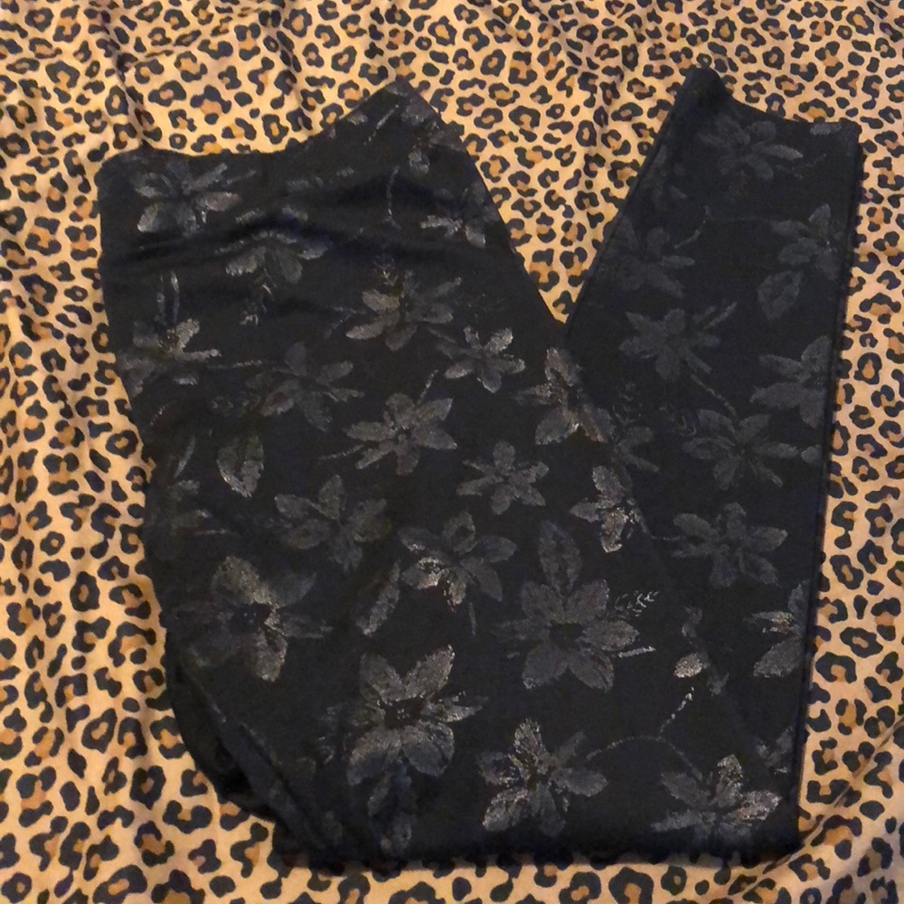 Black pull on pants with a floral print
